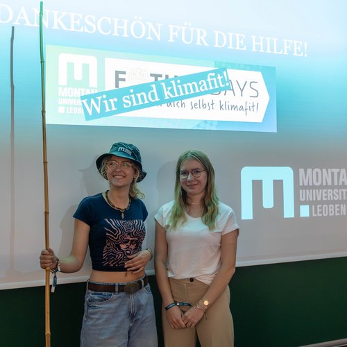 Two schoolgirls in front of a blackboard at the Future Days, Montanuni's summer camps.